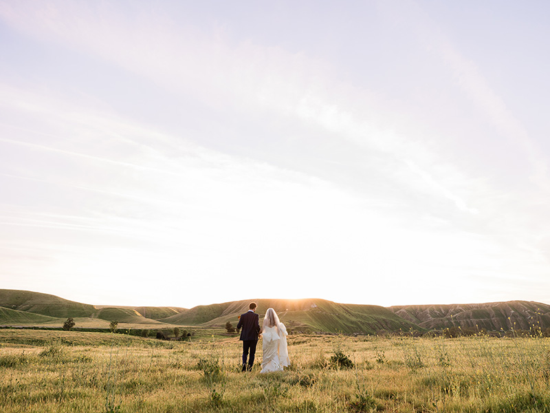 Wedding couple in field